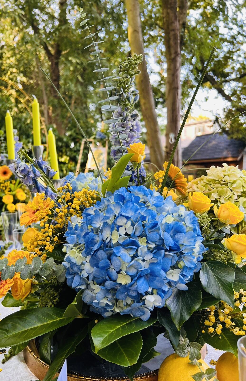 Blue and yellow event arrangement
