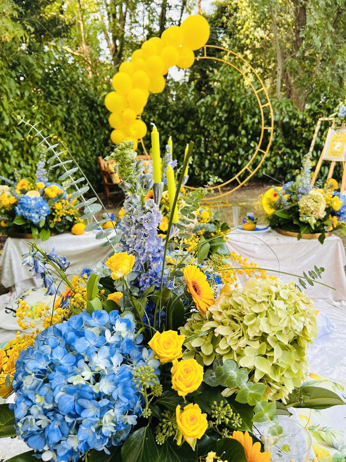 Blue and yellow outdoor tablescape
