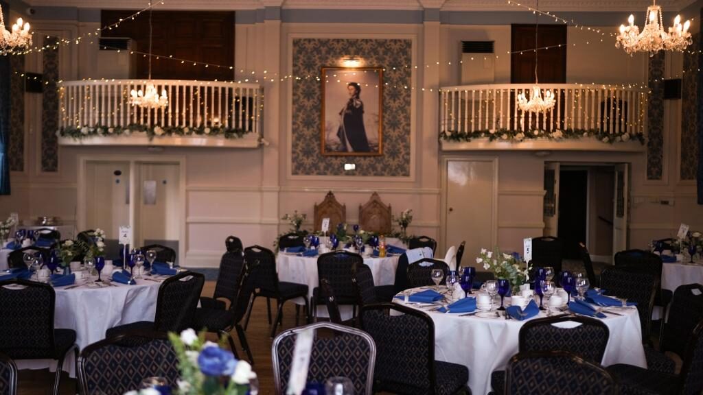 Elegant ballroom set for a reception