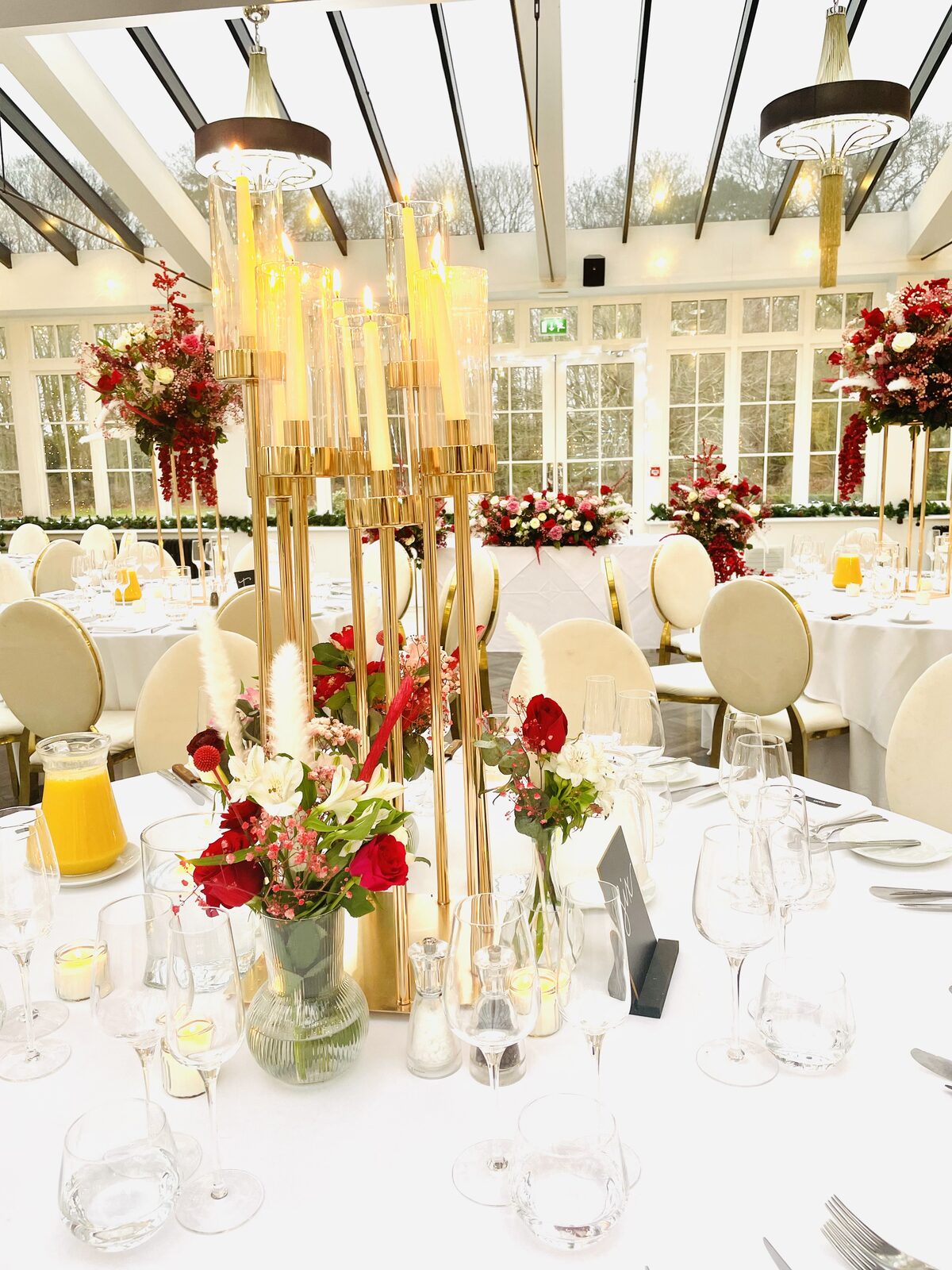 Festive red and gold conservatory tablescape