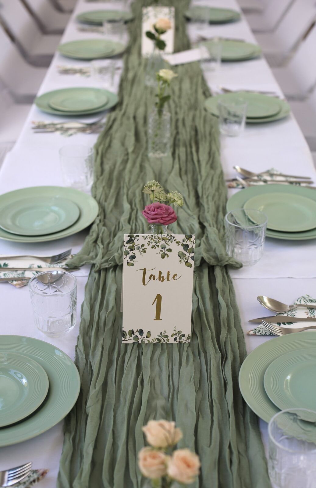 Sage green tablescape with bud vases